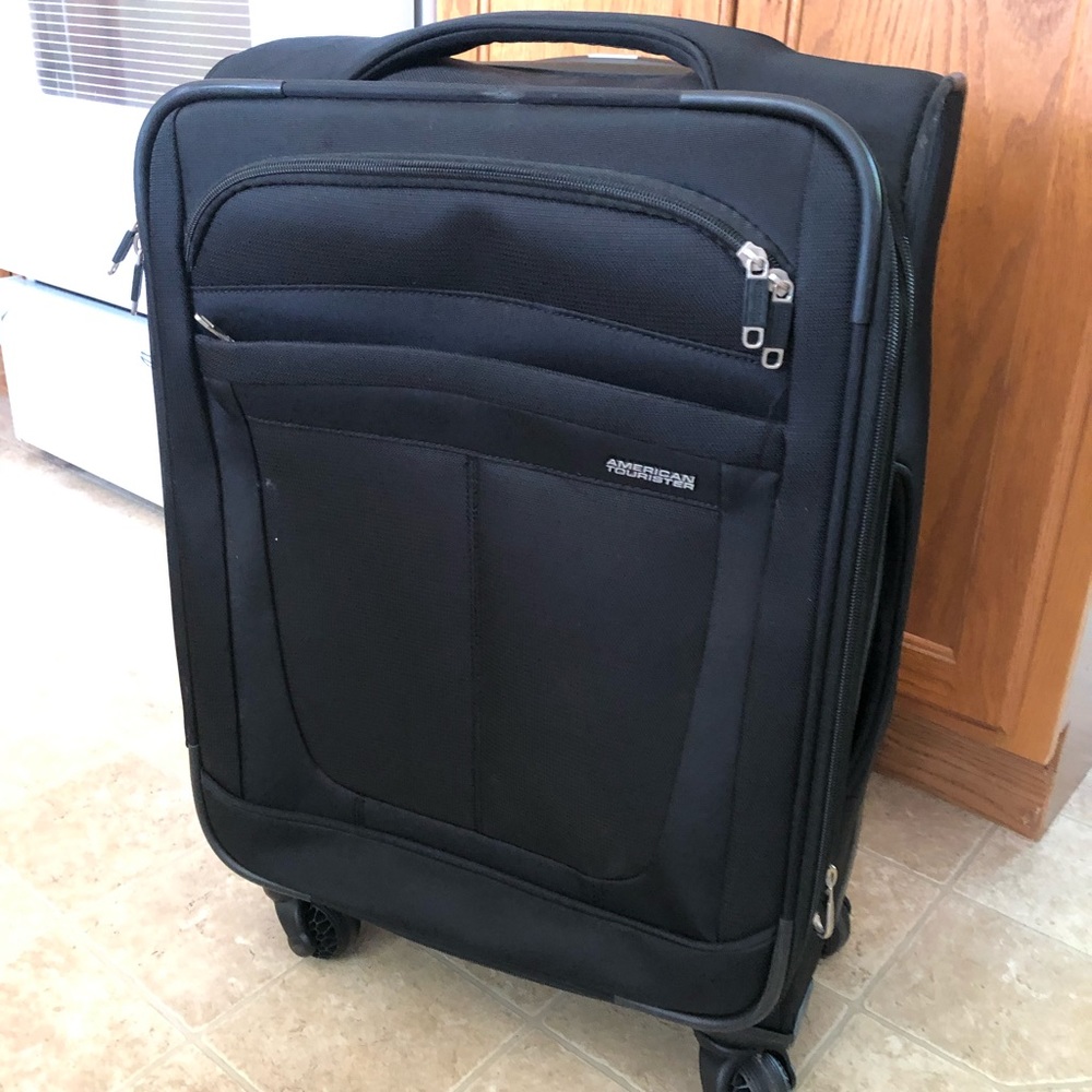 American Tourister rolling suitcase